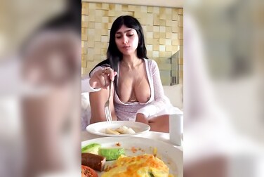 Mia Khalifa’s Tits ARE Breakfast: Watch The Porn Legend Get Her Huge Jugs Out While She Eats