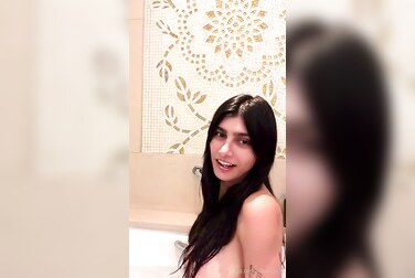 Mia Khalifa's Solo Seduction: Busty Babe Strips Down For Her Naughty Night Routine